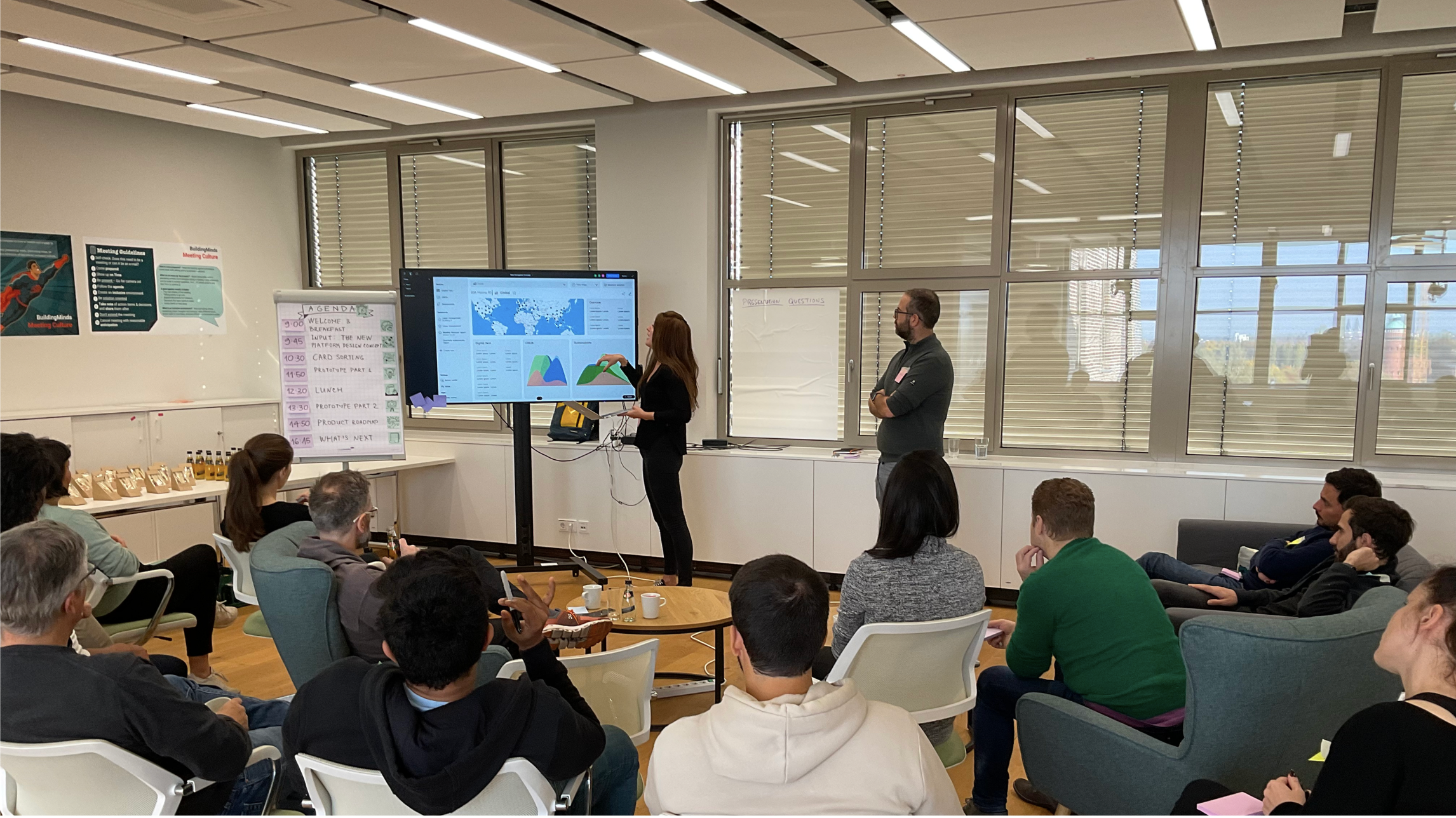 Product and technology team presentation slides displayed on a desktop computer monitor